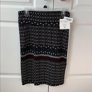 NWT LULAROE black Cassie skirt with a red, teal and white pattern